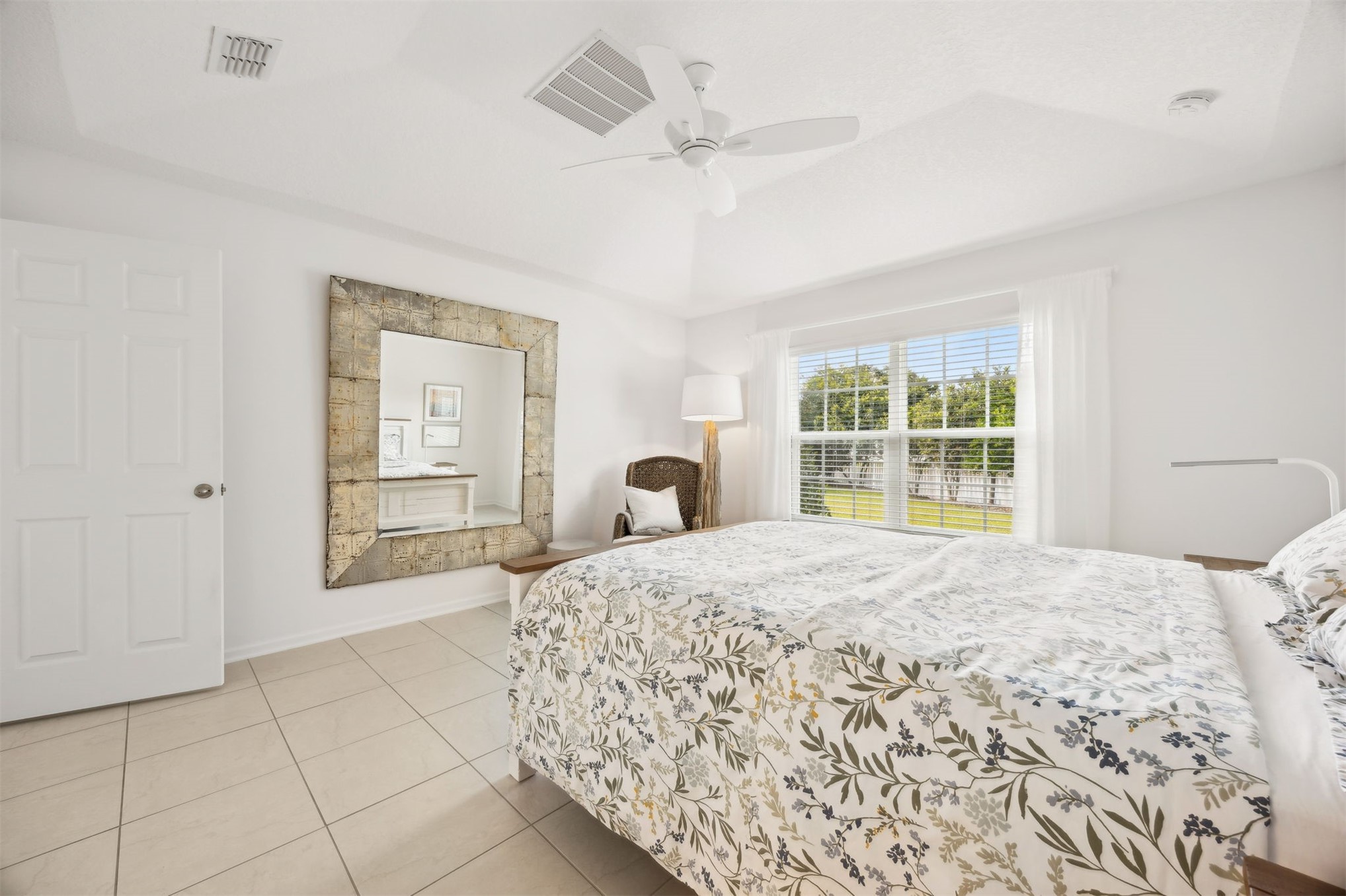 94037 Last Lane Yulee, FL 32097 - Photo 18 of 38 a bedroom with a bed and a window