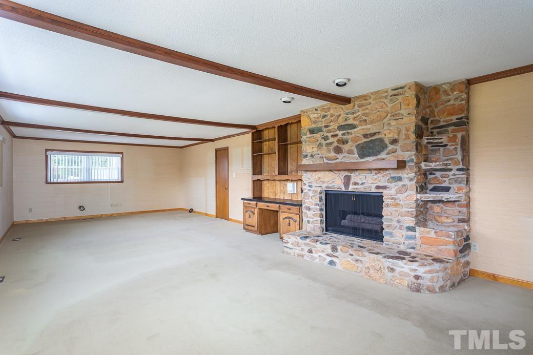 1628 Sherron Road Durham, NC 27703 - Photo 10 of 34 Large family room w/ masonry fireplace