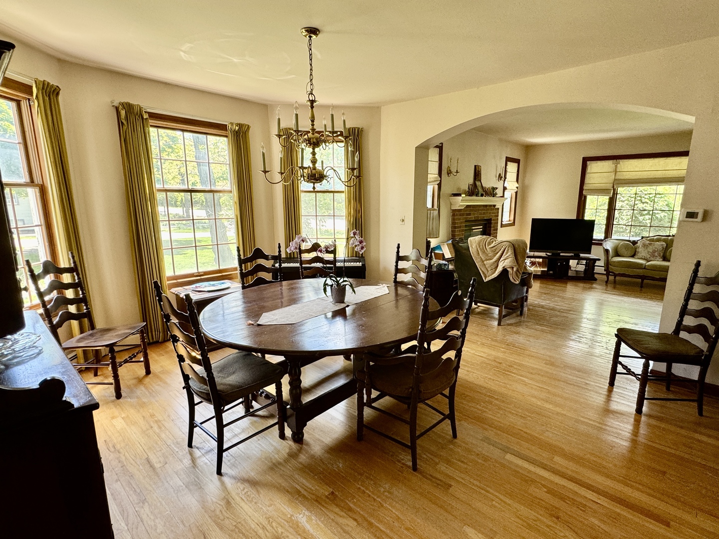 933 Harms Road Glenview, IL 60025 - Photo 6 of 25 a view of a dining room with furniture window and wooden floor