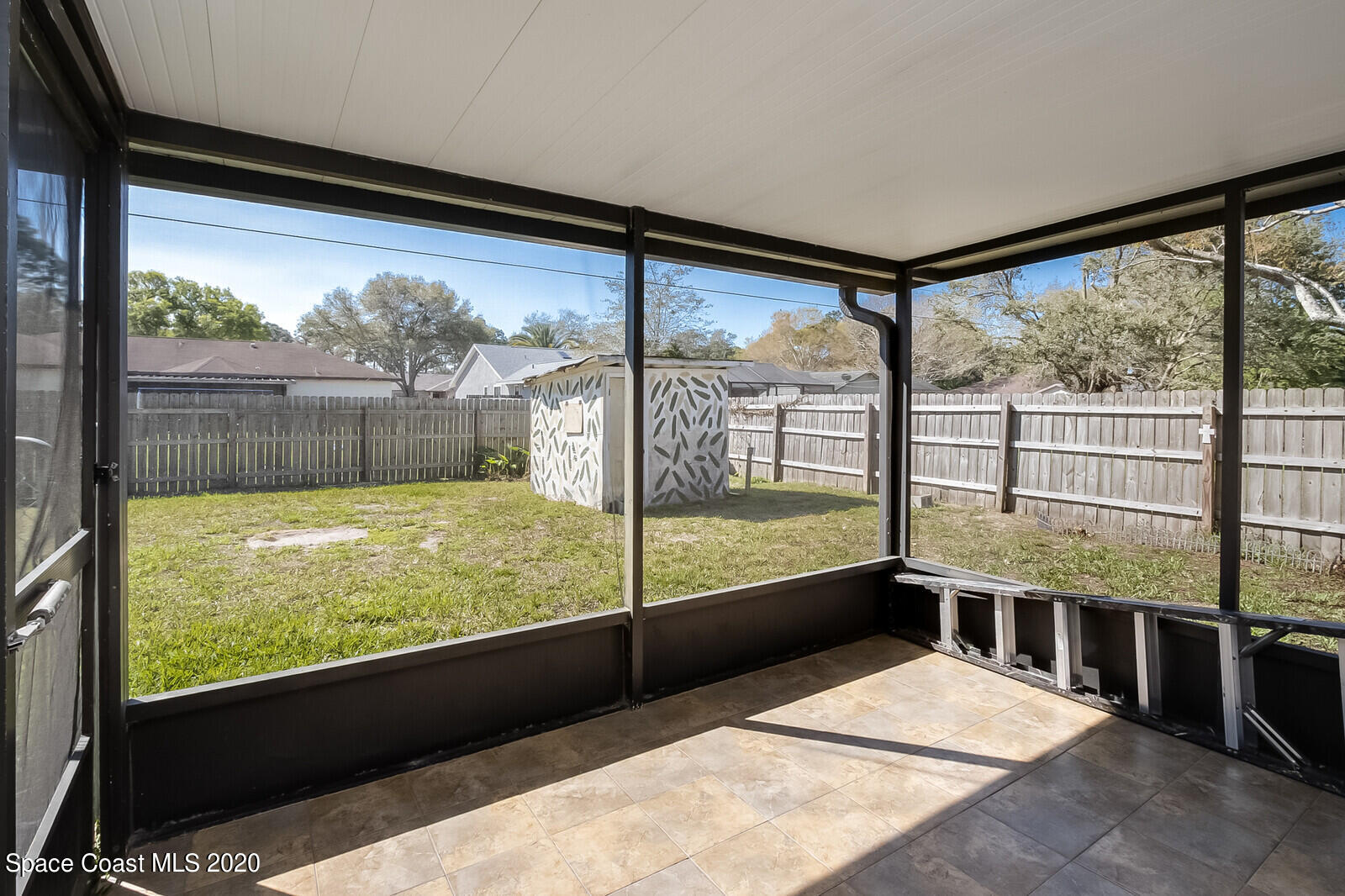 302 Stendal Road Northwest Palm Bay, FL 32907 - Photo 18 of 22 Screened patio