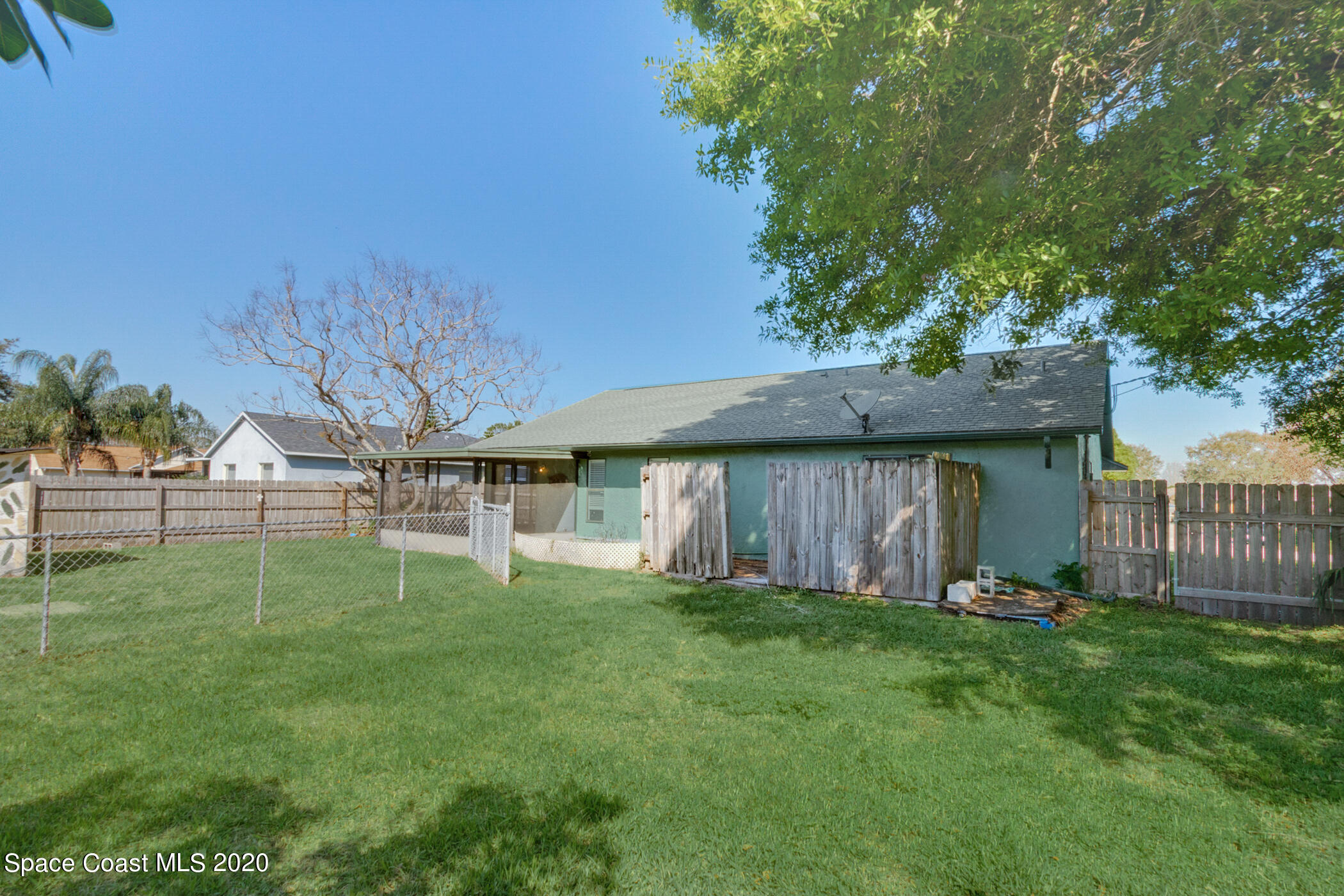 302 Stendal Road Northwest Palm Bay, FL 32907 - Photo 20 of 22 Backyard view