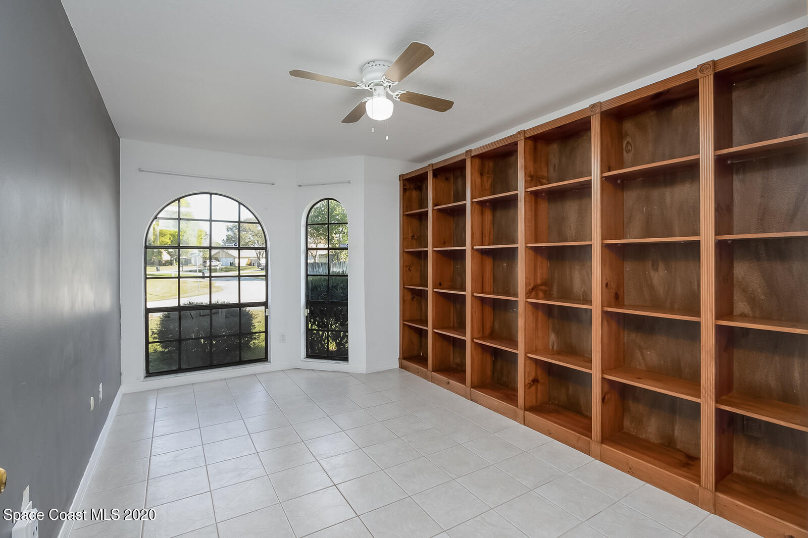 302 Stendal Road Northwest Palm Bay, FL 32907 - Photo 7 of 22 Office bookshelves