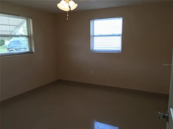 an empty room with a window