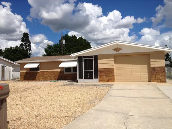 $1,825 | 1050 Clairborne Street, Holiday, FL 34690