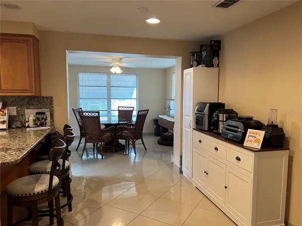 a view of a dining room with furniture
