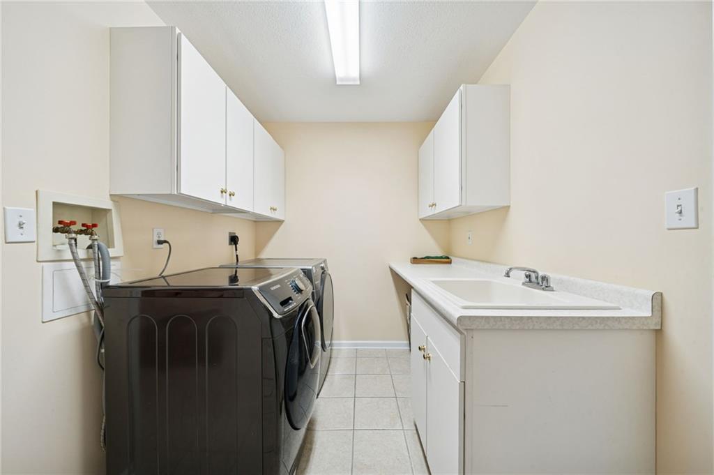 424 Scarletview Court Monroeville, PA 15146 - Photo 17 of 47 Laundry Room is conveniently located between the garage and kitchen