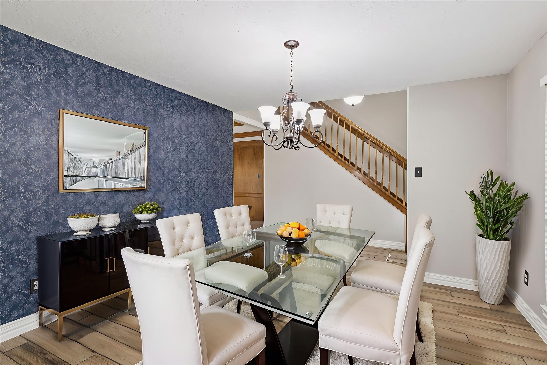 3630 Chapel Square Drive Spring, TX 77388 - Photo 11 of 24 a view of a dining room with furniture wooden floor and chandelier