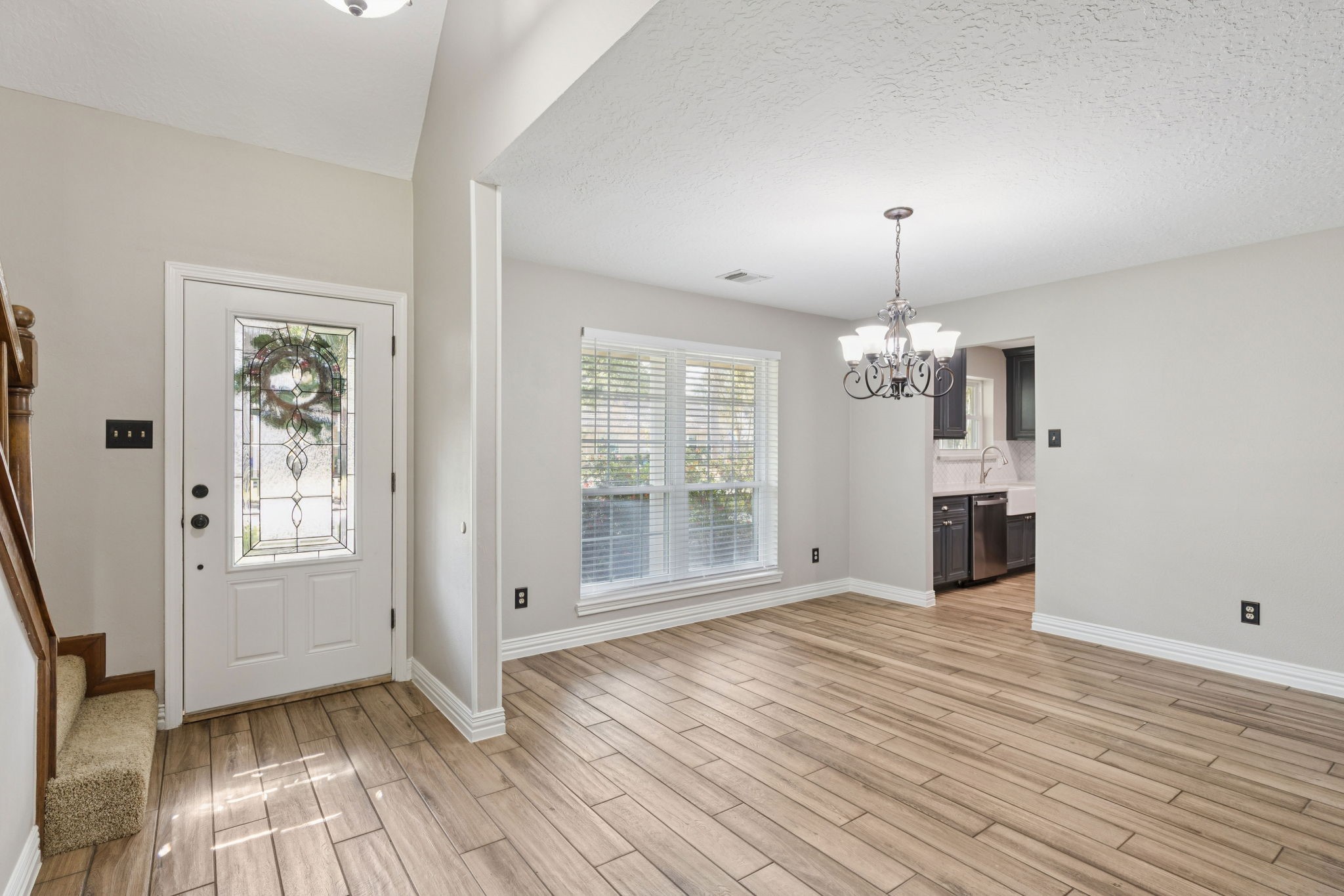 3630 Chapel Square Drive Spring, TX 77388 - Photo 18 of 24 an empty room with wooden floor and windows