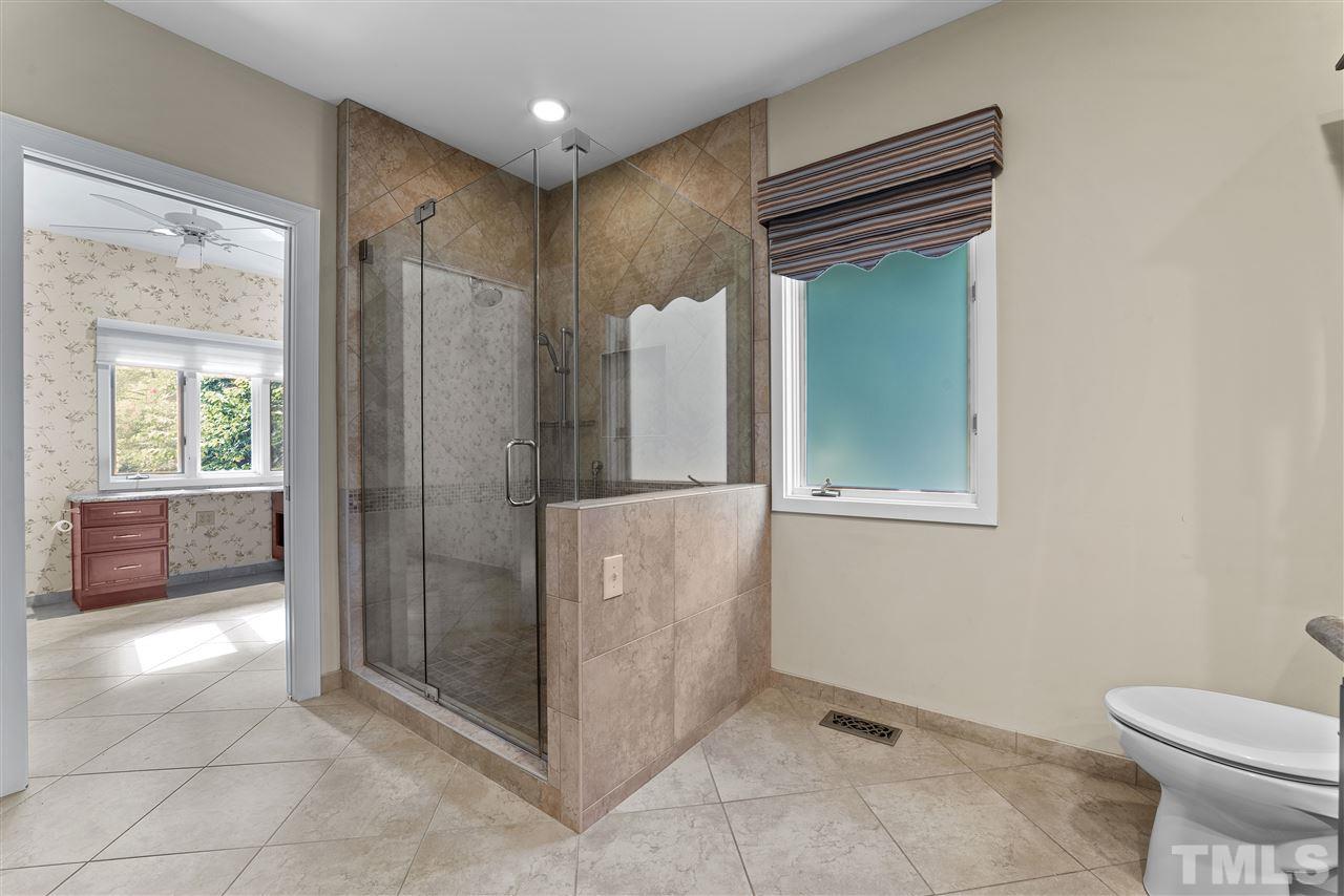 2008 Prescott Place Raleigh, NC 27615 - Photo 22 of 30 a bathroom with a toilet and a shower