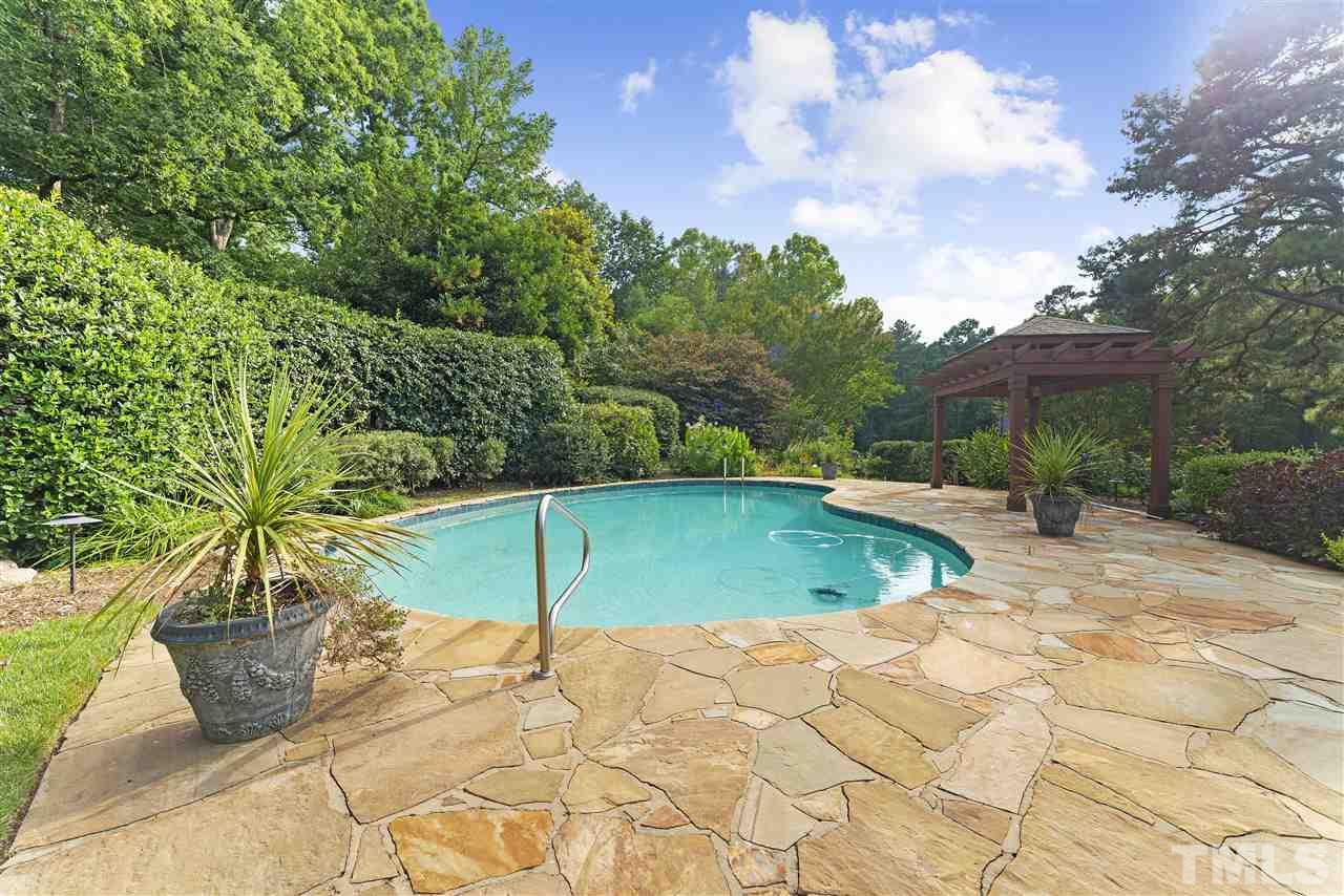 2008 Prescott Place Raleigh, NC 27615 - Photo 5 of 30 a view of a swimming pool with a patio