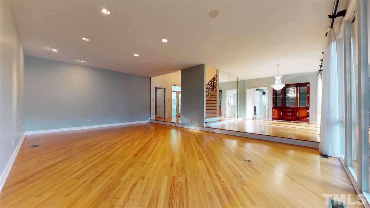 2008 Prescott Place Raleigh, NC 27615 - Photo 10 of 30 a view of empty room with wooden floor and fan