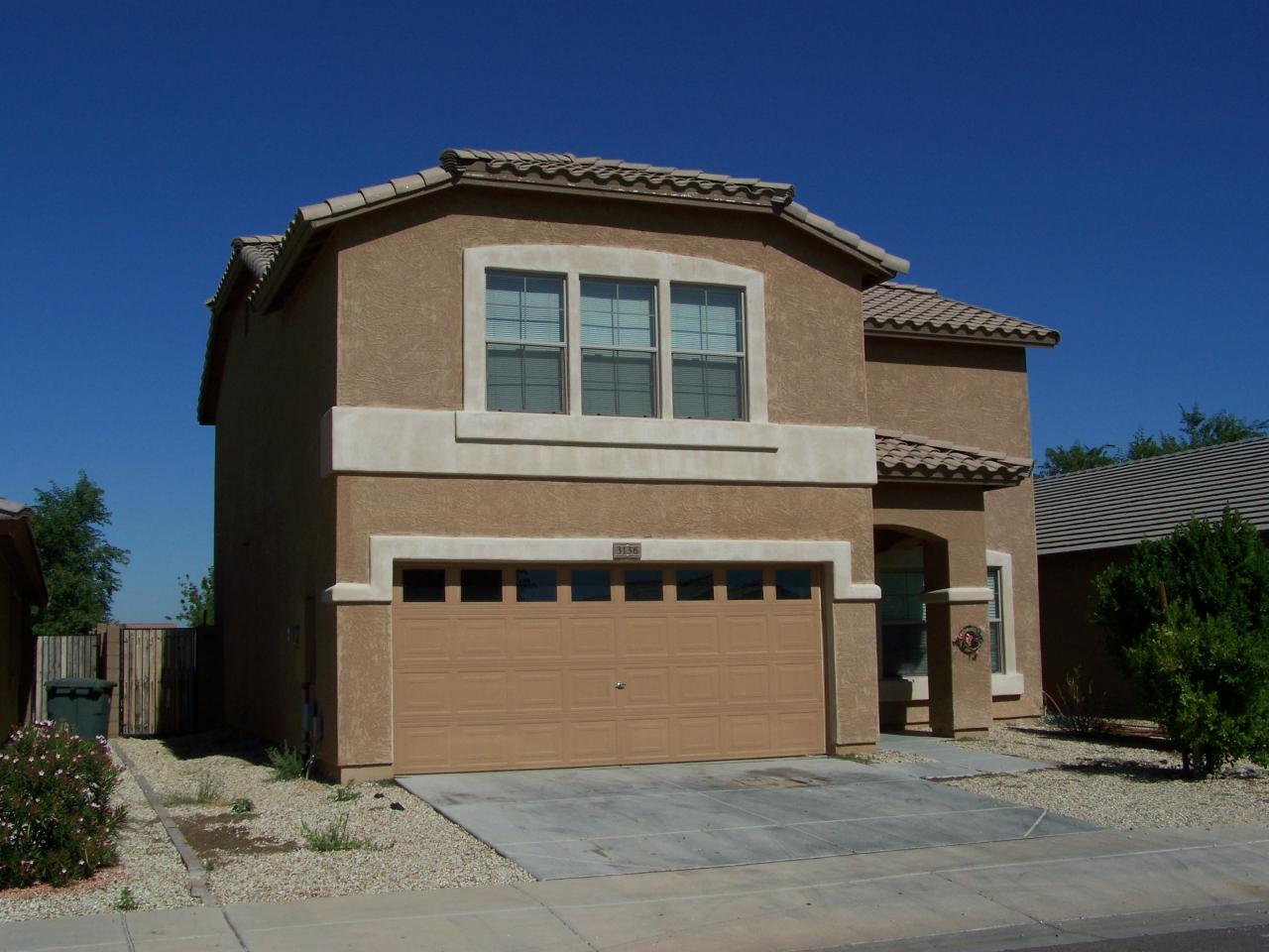 3136 West Maldonado Road Phoenix, AZ 85041 - Photo 1 of 1 a front view of a house