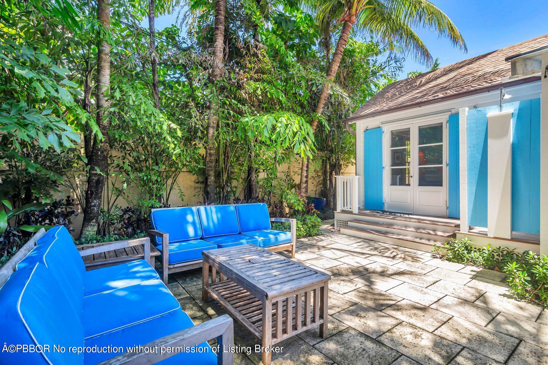 138 Root Trail Palm Beach, FL 33480 - Photo 18 of 23 a view of a chairs in a patio