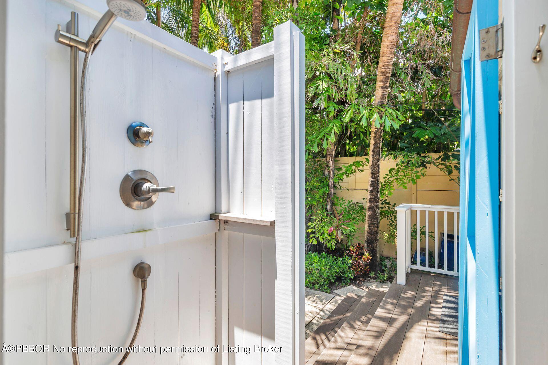 138 Root Trail Palm Beach, FL 33480 - Photo 19 of 23 a view of a glass door with a glass door and a window