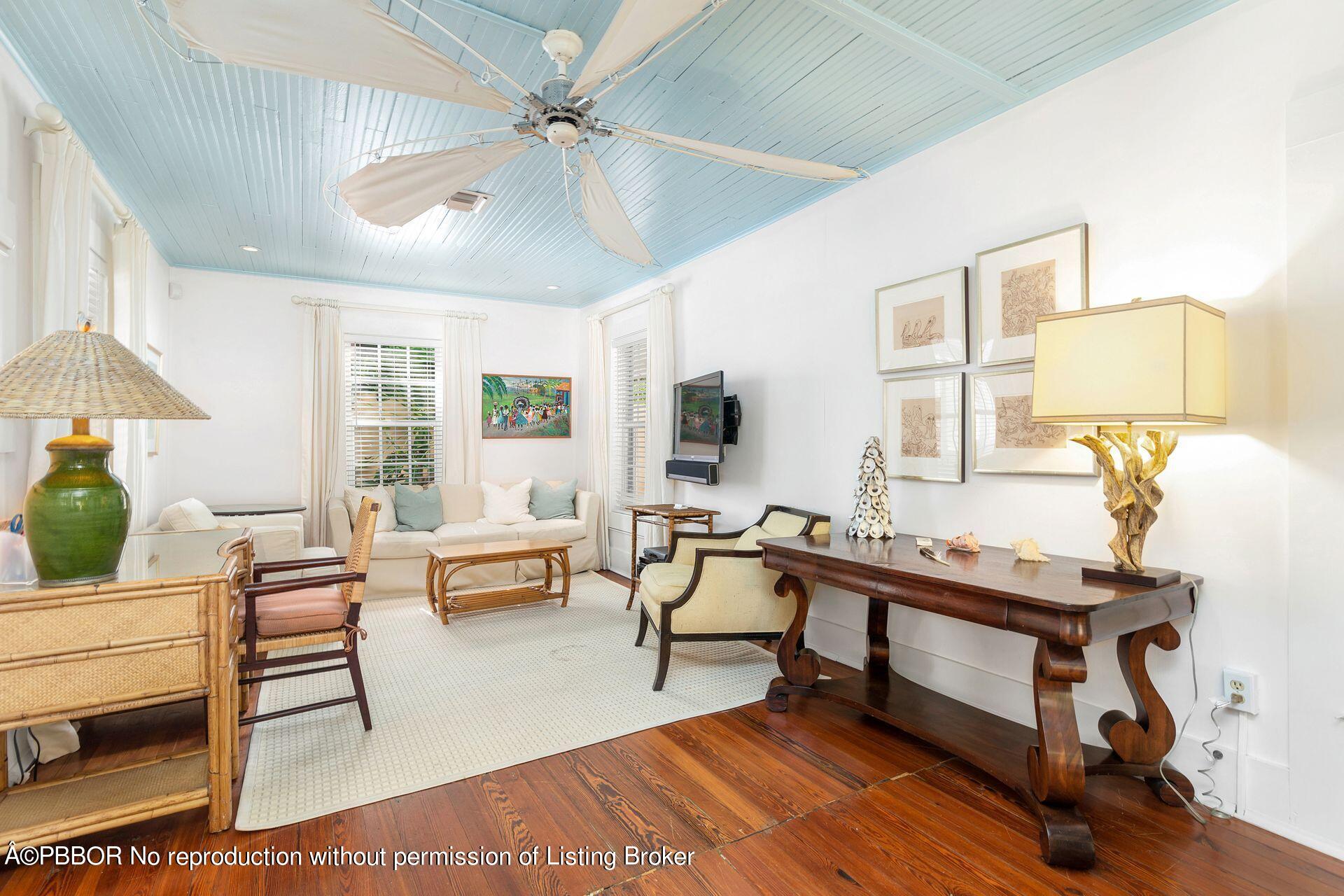 138 Root Trail Palm Beach, FL 33480 - Photo 5 of 23 a living room with furniture and a table