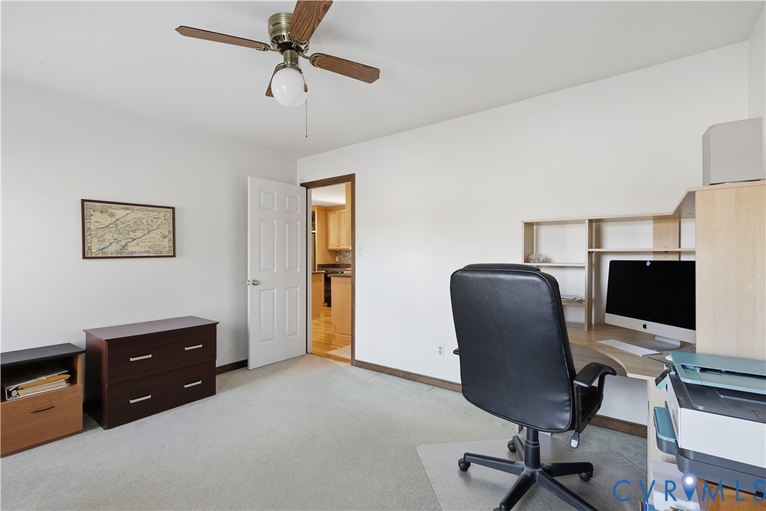 2326 Mill Road Powhatan, VA 23139 - Photo 19 of 50 a view of a workspace with furniture and a window