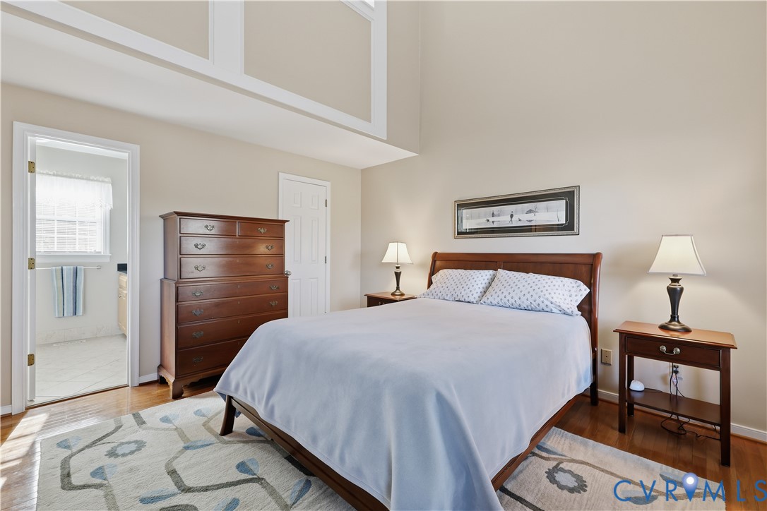 2326 Mill Road Powhatan, VA 23139 - Photo 21 of 50 a bedroom with a bed and a table in it