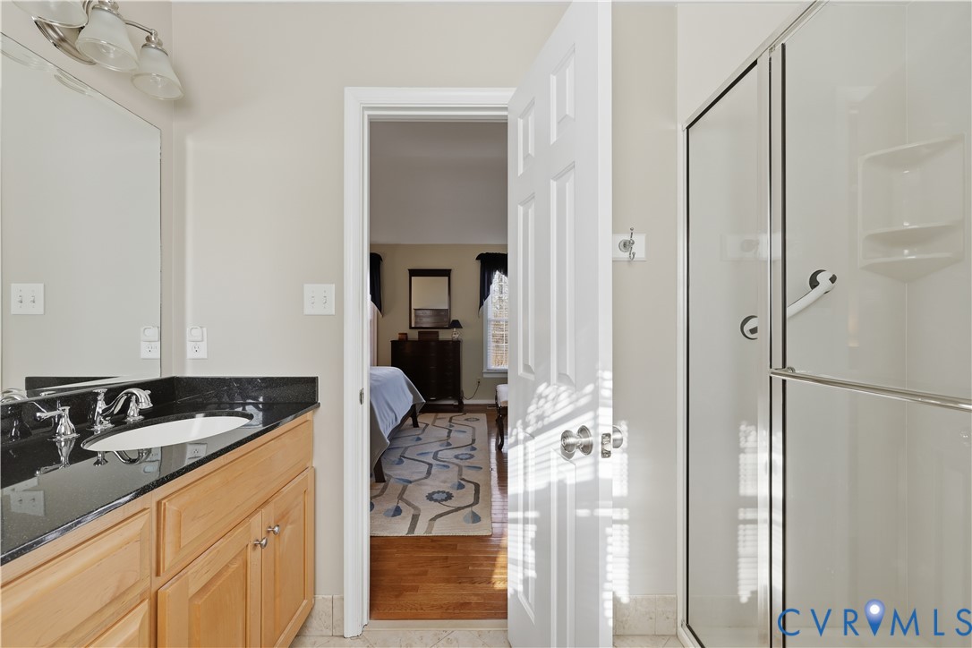 2326 Mill Road Powhatan, VA 23139 - Photo 22 of 50 a kitchen with stainless steel appliances granite countertop a refrigerator and a sink