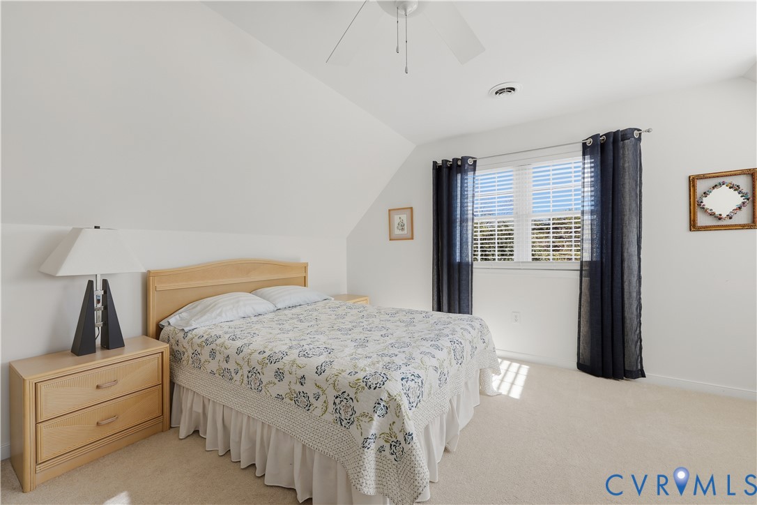 2326 Mill Road Powhatan, VA 23139 - Photo 33 of 50 a bedroom with a large bed and a window