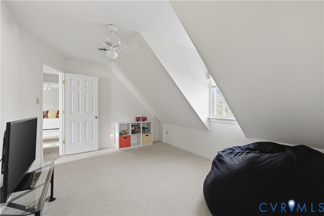 2326 Mill Road Powhatan, VA 23139 - Photo 36 of 50 a living room with furniture and a flat screen tv