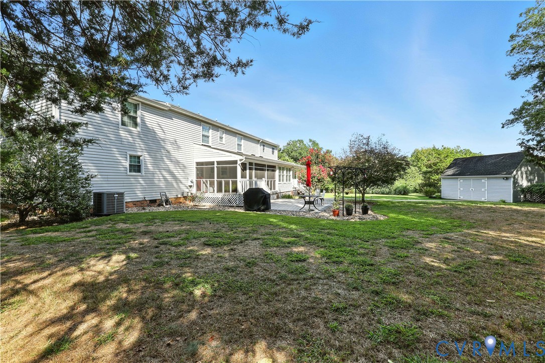 2326 Mill Road Powhatan, VA 23139 - Photo 40 of 50 a view of a house with a back yard