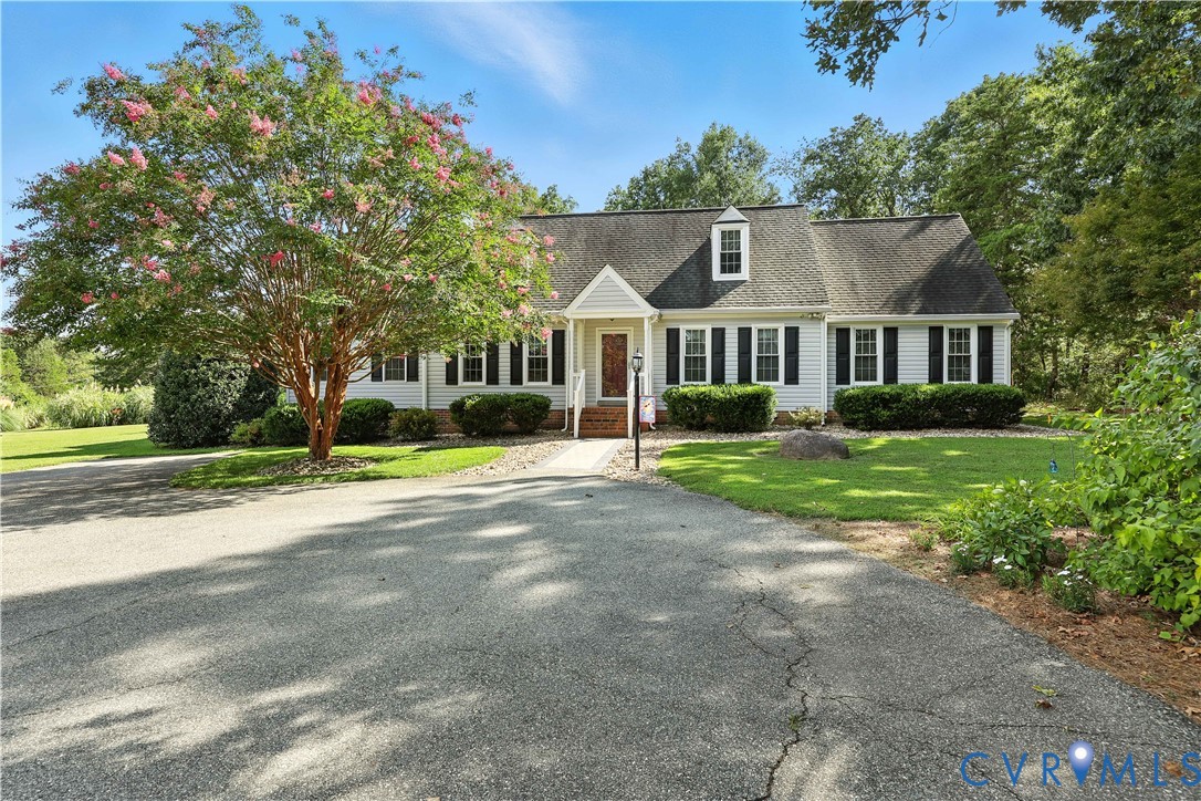 2326 Mill Road Powhatan, VA 23139 - Photo 41 of 50 a front view of house with yard and green space