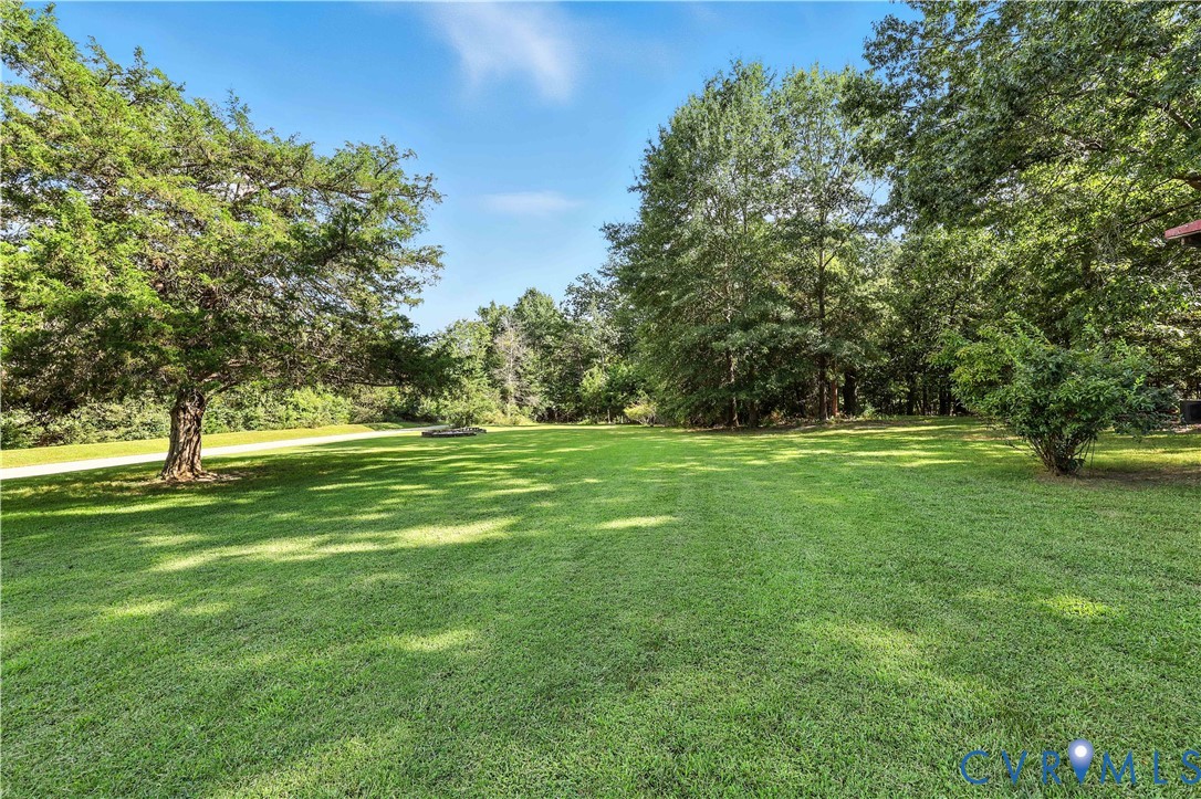 2326 Mill Road Powhatan, VA 23139 - Photo 43 of 50 a view of green field with trees in the background