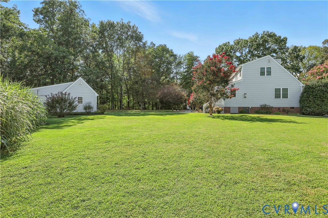 2326 Mill Road Powhatan, VA 23139 - Photo 44 of 50 a view of a house with a yard and garage