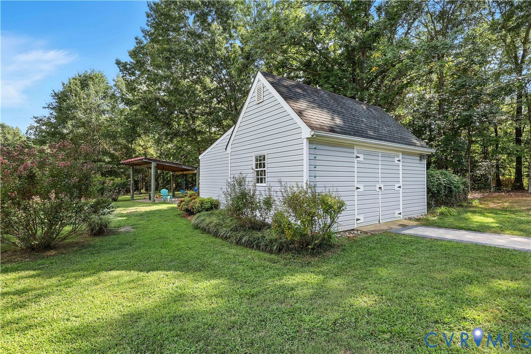 2326 Mill Road Powhatan, VA 23139 - Photo 48 of 50 a view of a house with yard and a garden