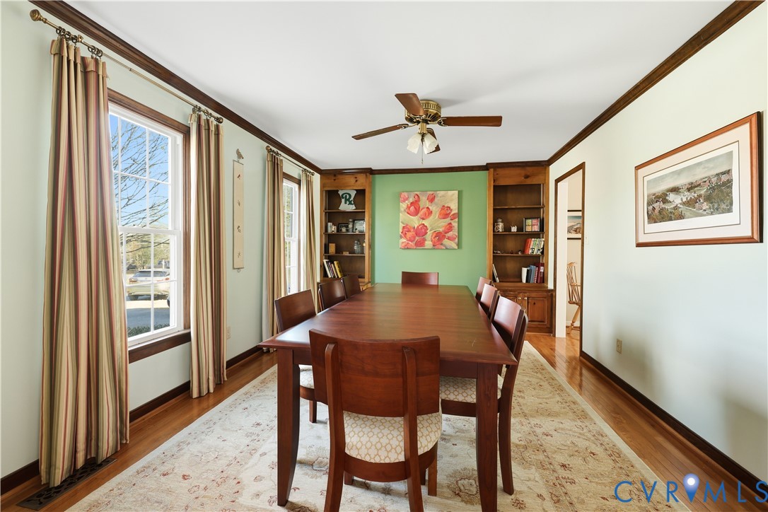 2326 Mill Road Powhatan, VA 23139 - Photo 4 of 50 a view of a dining room with furniture window and wooden floor