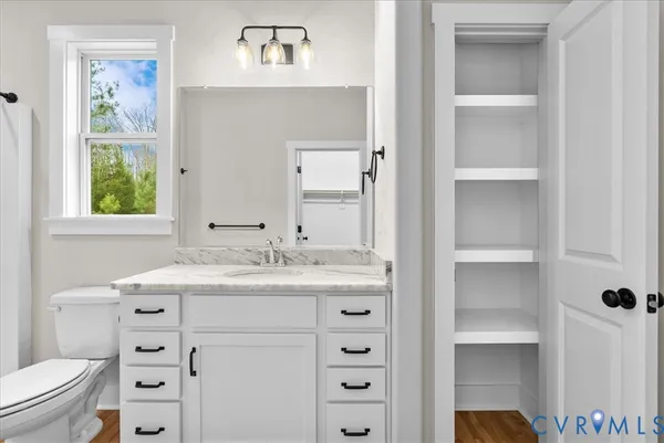 a view of a park that has a sign board