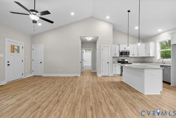 a house with swimming pool in front of it