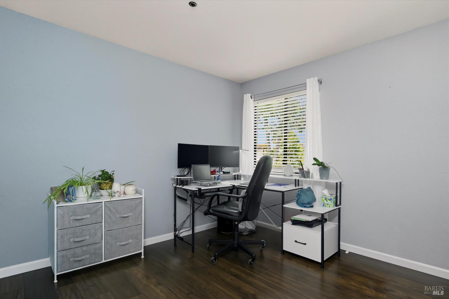 8201 Camino Colegio, Unit 122 Rohnert Park, CA 94928 - Photo 12 of 27 a view of a workspace with furniture and a window