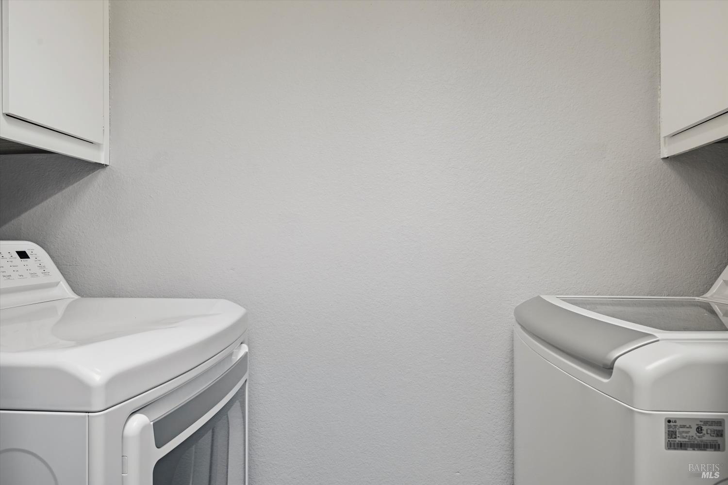 8201 Camino Colegio, Unit 122 Rohnert Park, CA 94928 - Photo 15 of 27 a utility room with dryer and washer