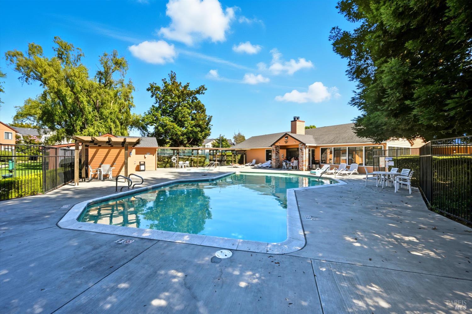 8201 Camino Colegio, Unit 122 Rohnert Park, CA 94928 - Photo 20 of 27 a front view of a house with a yard
