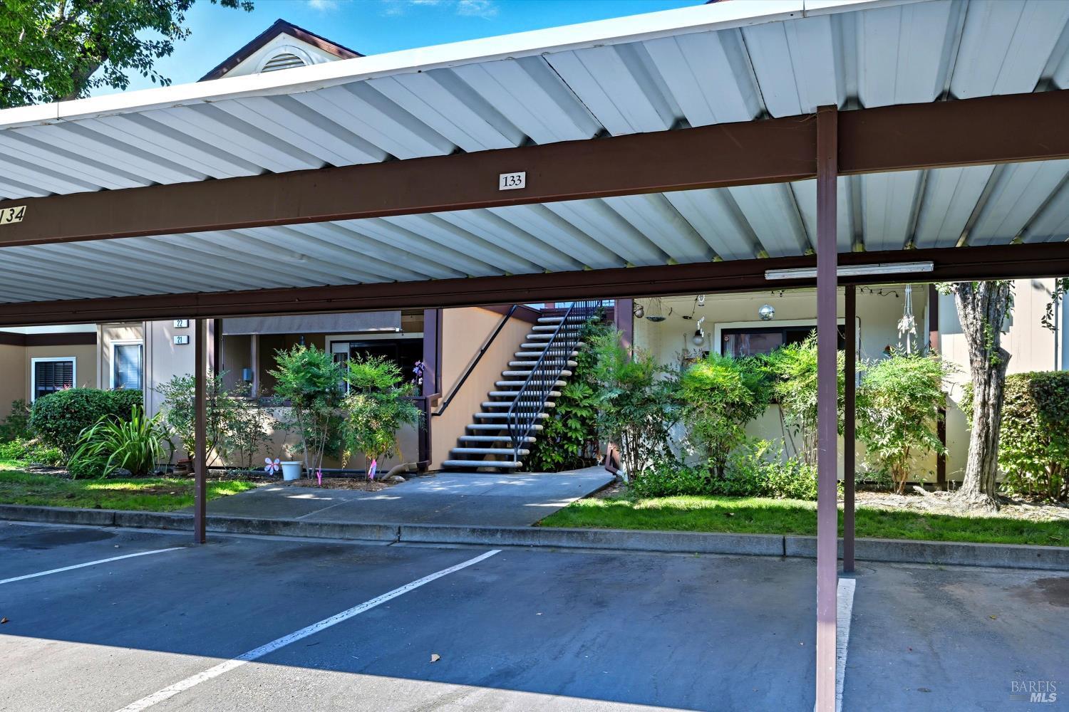 8201 Camino Colegio, Unit 122 Rohnert Park, CA 94928 - Photo 27 of 27 a patio with a yard table and chairs