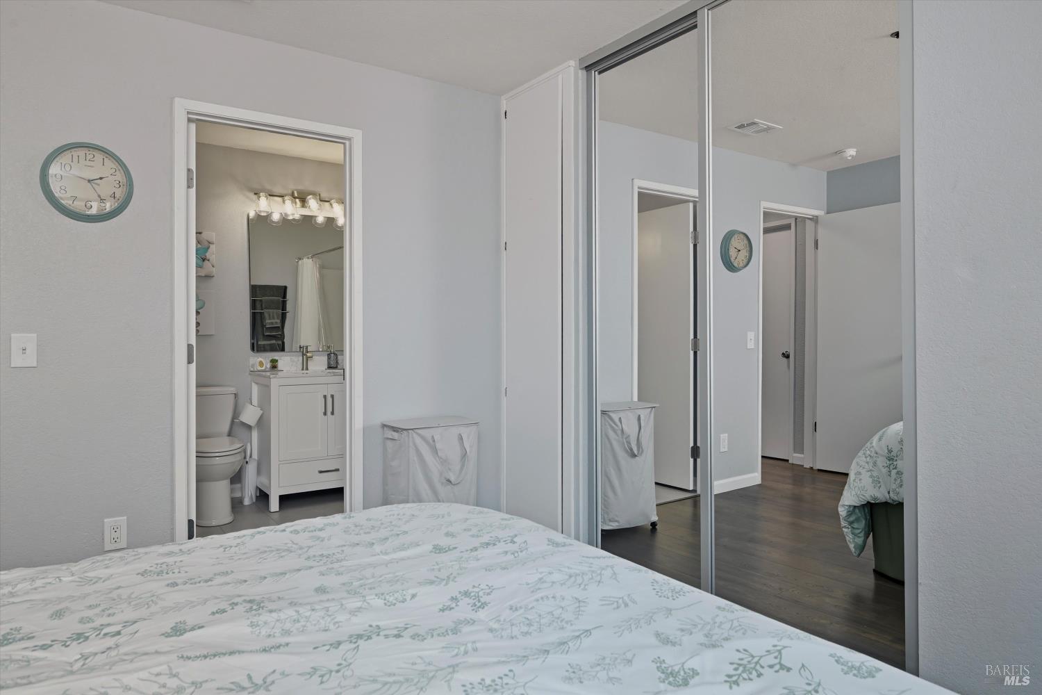 8201 Camino Colegio, Unit 122 Rohnert Park, CA 94928 - Photo 10 of 27 a bedroom with a bed and a bathroom