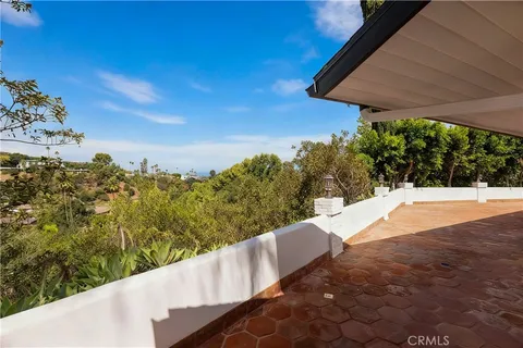 a view of entrance gate of a house