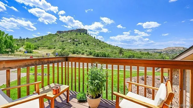 a view of a chairs in a balcony