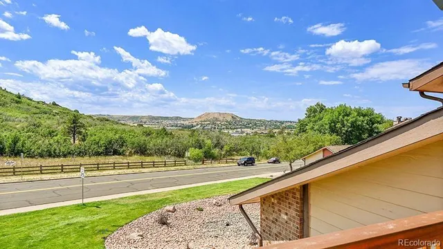 a view of swimming pool with a yard