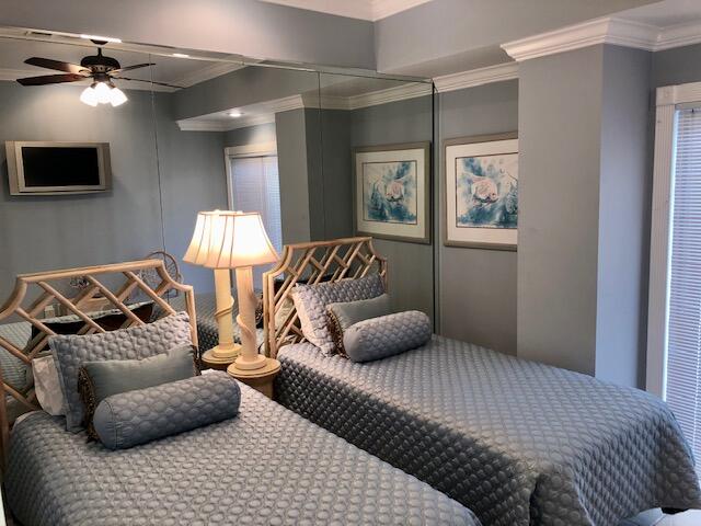 197 Durango Road, Unit 6C Destin, FL 32541 - Photo 32 of 62 a bedroom with a bed and window