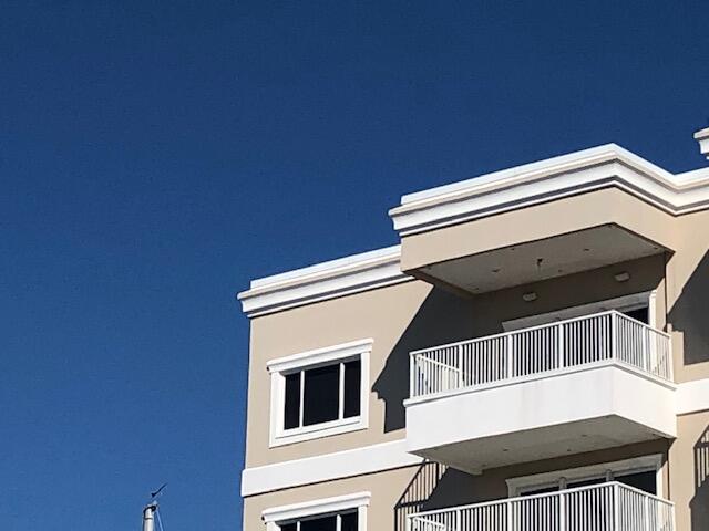 197 Durango Road, Unit 6C Destin, FL 32541 - Photo 4 of 62 a view of a house with a balcony