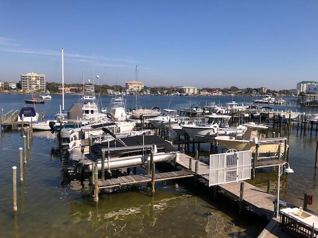 197 Durango Road, Unit 6C Destin, FL 32541 - Photo 54 of 62 a view of a lake with tall buildings