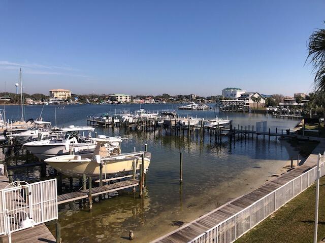 197 Durango Road, Unit 6C Destin, FL 32541 - Photo 58 of 62 a view of a lake yard and mountain view