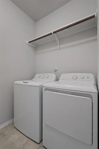 a kitchen with granite countertop stainless steel appliances and cabinets