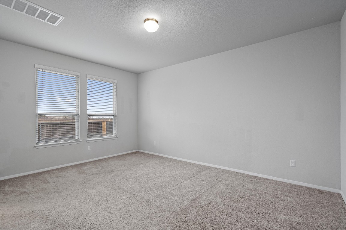 300 Delta Crest Maxwell, TX 78656 - Photo 13 of 36 an empty room with a window