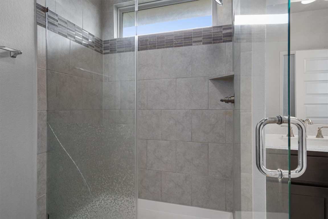 300 Delta Crest Maxwell, TX 78656 - Photo 16 of 36 a bathroom with a shower