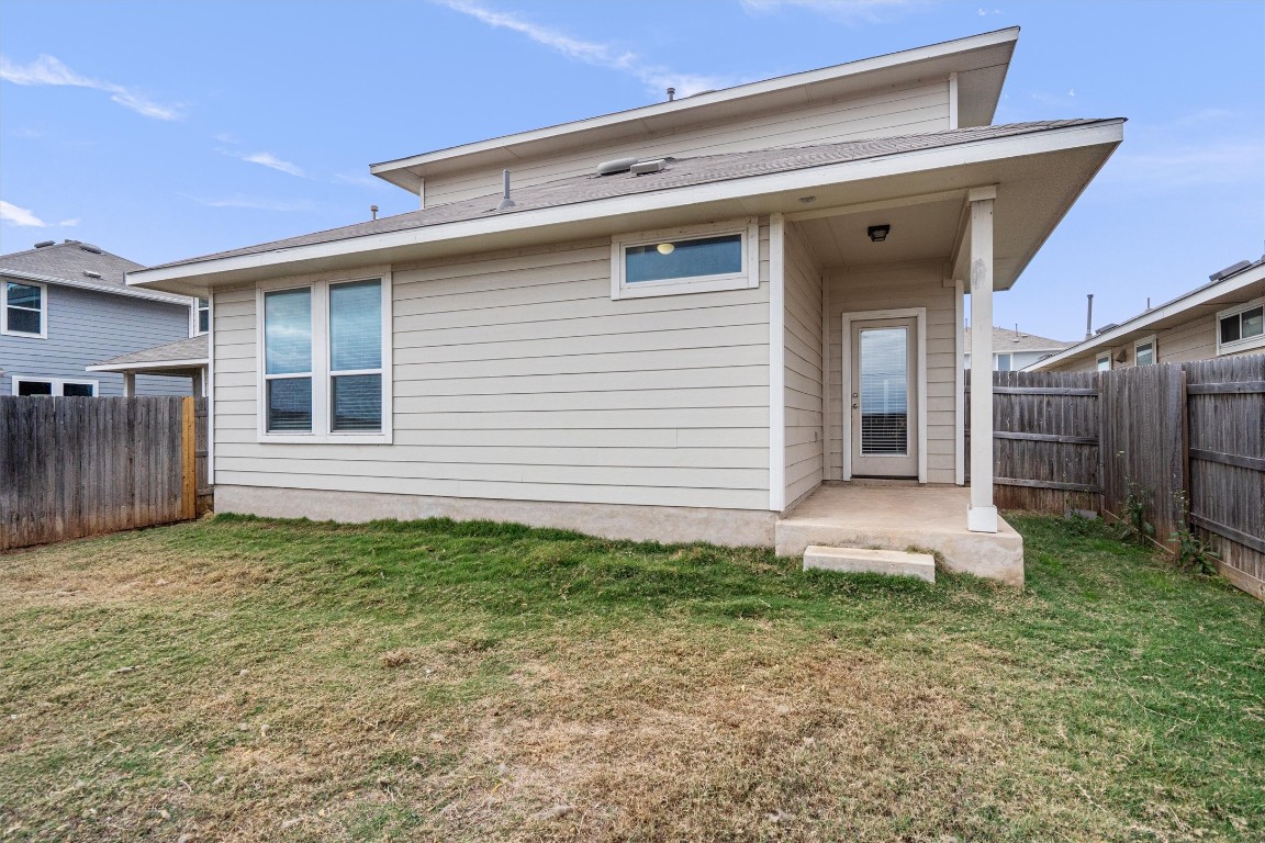 300 Delta Crest Maxwell, TX 78656 - Photo 27 of 36 a view of a house with backyard and porch
