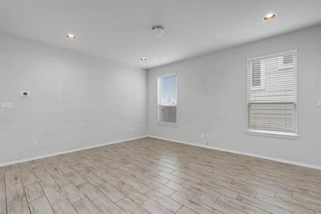 a view of kitchen with wooden floor