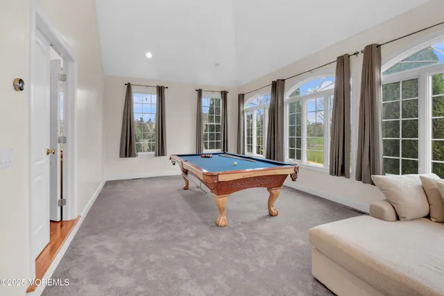 a bathroom with a sink vanity and toilet